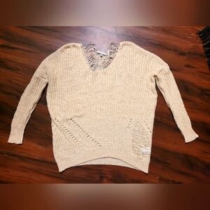 PAPAYA cream colored sweater. Meant to look ripped. Size S/M.